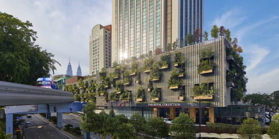 Situated in the heart of a bustling city, surrounded by urban architecture and vibrant city life.